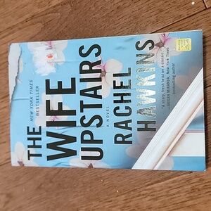 The Wife Upstairs by Rachel Hawkins - Captivating Blue Cover